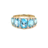 Blue Topaz and Diamond Bridge Ring in 9ct Gold