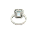 Emerald Cut Aquamarine and Diamond Channel Halo Ring