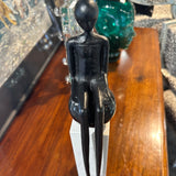Long Legged Person on Marble Column Figurine