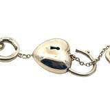 Curb Link Bracelet with Puff Heart Clasp in 9ct Yellow Gold