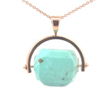 Natural Turquoise Spinner Pendant in Yellow Gold