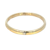 Oval Hollow Snap Bangle 14 Carat Gold