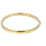 Oval Hollow Snap Bangle 14 Carat Gold