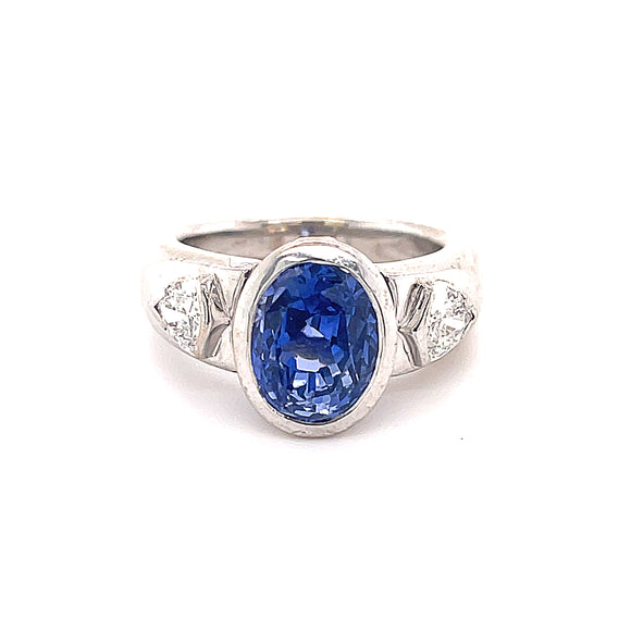 Large Oval Sapphire Trilliant Cut Diamond Ring
